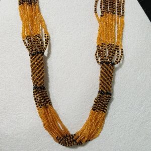 Elegant Beaded Necklace in Orange and Black